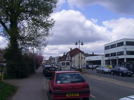Ascot High Street as seen from the corner of the Winkfield Road. The course is behind the buildings on the right.